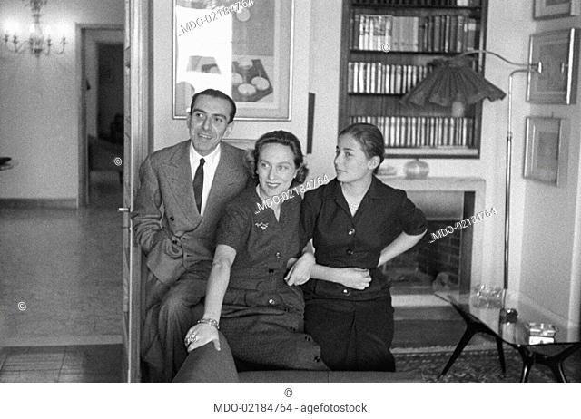 The Italian politician Dino Del Bo (Rinaldo Del Bo) posing with his wife and his daughter. Rome, 24th January 1958