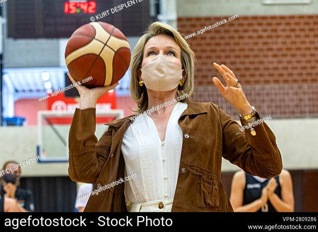Queen Mathilde of Belgium pictured in action during a royal visit to the Belgian Cats, the Belgian national women's basketball team, in Kortrijk