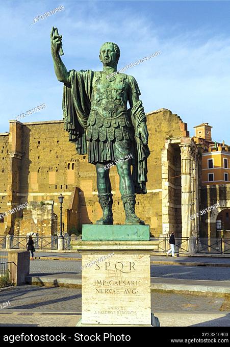 Rome, Italy. Statue of the Emperor Nerva with Trajan's Forum behind. The historic centre of Rome is a UNESCO World Heritage Site