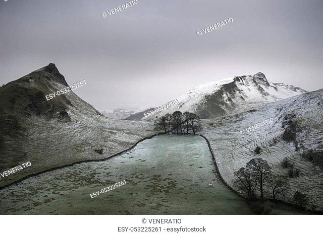 Beautiful Winter landscape image of Chrome Hill and Parkhouse Hill in Peak District England