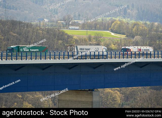 30 March 2020, Rhineland-Palatinate, Winningen: On the Moselle valley bridge of the A61 there is a lot of truck traffic. Due to the corona crisis