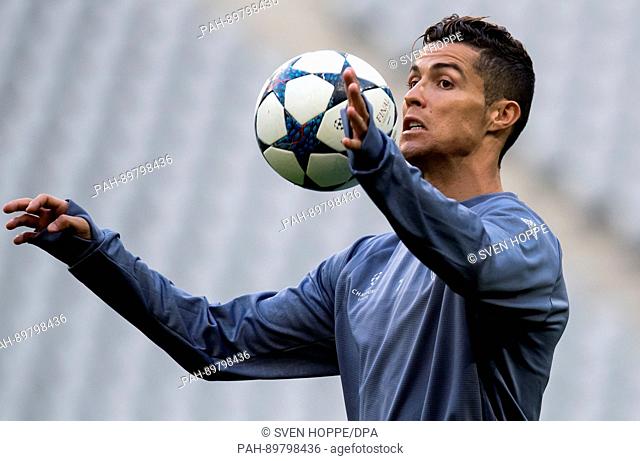 dpatop - Real Madrid's Christiano Ronaldo at a training session in the Allianz Arena in Munich, Germany, 11 April 2017. The reigning champions from Spain will...