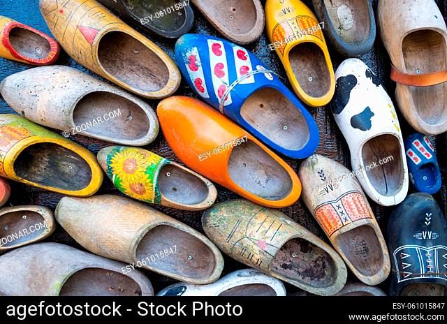 traditional dutch wooden shoes hanging on a wall as decoration