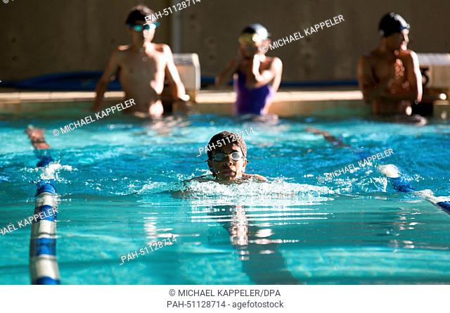 Students of Brazil's first sports high school, Ginasio Experimental Olimpico (GEO), are practicing in the swimming hall of their school in Rio de Janeiro