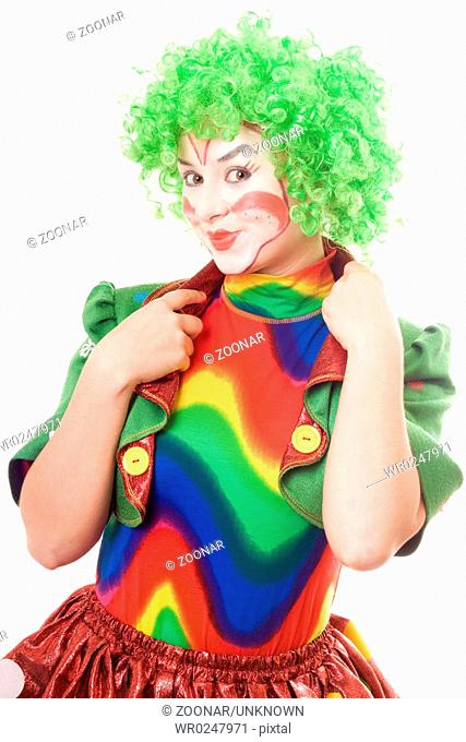 Portrait of smiling female clown. Isolated on white background