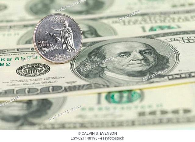 Hawaii State Quarter on one hundred dollar bills background