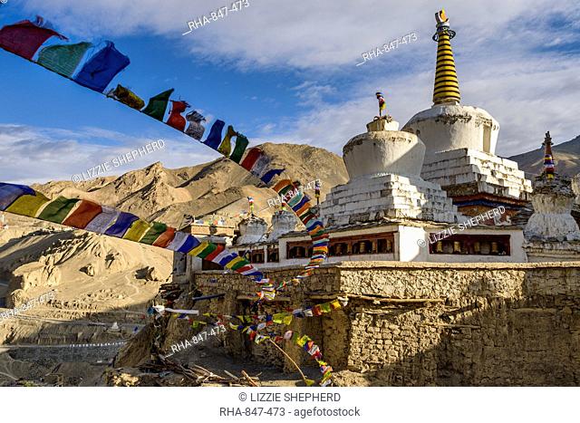 Prayer flags and stupa at the monastery at Lamayuru, Ladakh, Himalayas, India, Asia