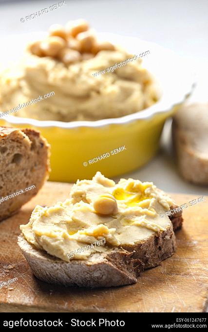 still life of hummus with bread