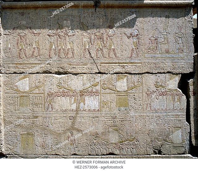 Relief on the southern outside facade of the naos of Philip Arrhidaeus, Karnak. Top register shows the purification & crowning of the king by Thoth & Horus