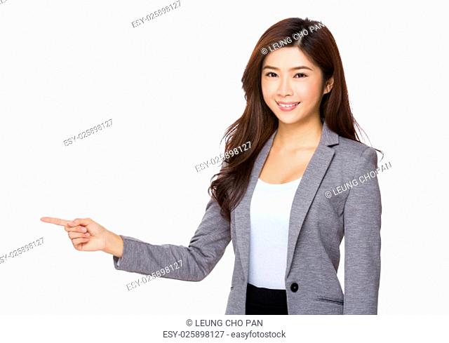 Asian Businesswoman with finger point aside