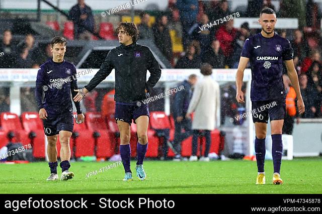 Anderlecht's Yari Verschaeren, Anderlecht's Fabio Silva and Anderlecht's Zeno Debast look dejected after a soccer match between SV Zulte Waregem and RSC...