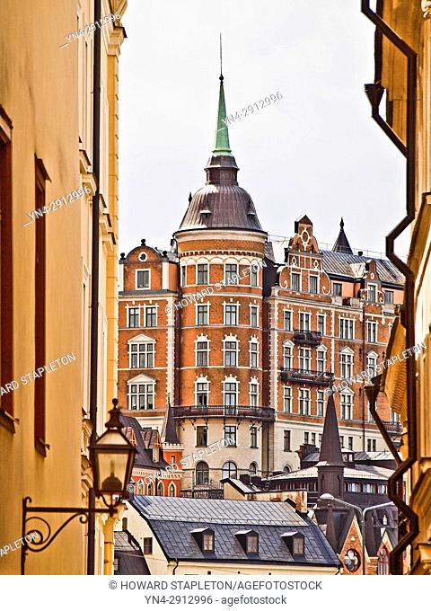 Old buildings in Stockholm, Sweden, The red building known as Laurinska Huset also known as Mälarpalatset, is located at Bellmansgatan 4-6 in Södermalm