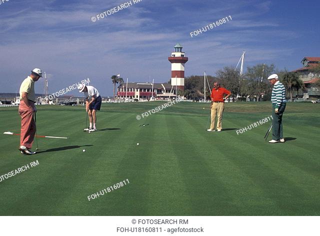 golf, Hilton Head Island, SC, South Carolina, Golfer putting on the 18th Hole at the MCI Heritage Golf Classic in Harbour Town on Hilton Head Island