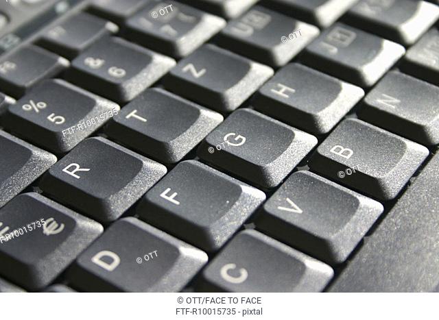 Close up of computer keys on a black keyboard