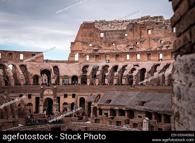 ROME, ITALY - NOVEMBER 16, 2017: View of the interior of the Colosseum in Rome crowded with tourists