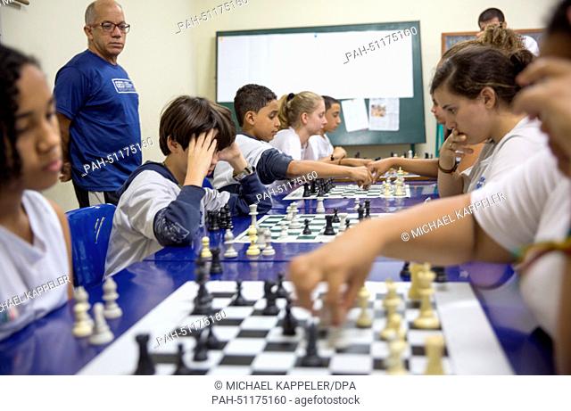 Students of Brazil's first sports high school, Ginasio Experimental Olimpico (GEO), play a round of chess in Rio de Janeiro, Brazil, 8 August 2014