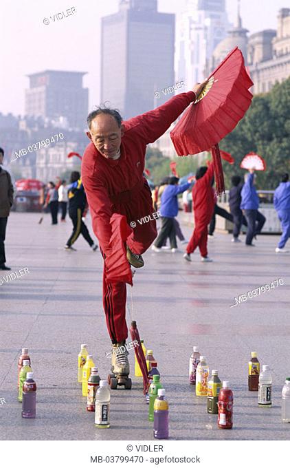 China, Shanghai, 'association',  Chinese, roller skates, movement   Asia, Eastern Asia, place, native, clothing red,  Hands, subjects red, holding, bottles