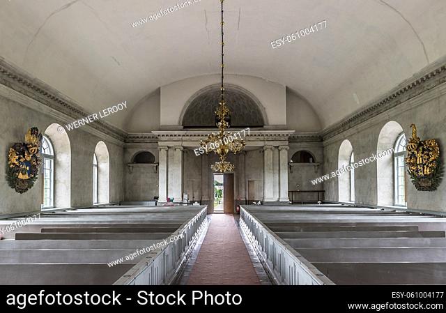 Forsmark, Osthammar - Sweden - Symmetric interior design of the evangelic church with wooden decorations