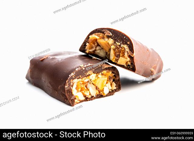 Chocolate bars with nuts filling isolated on white background