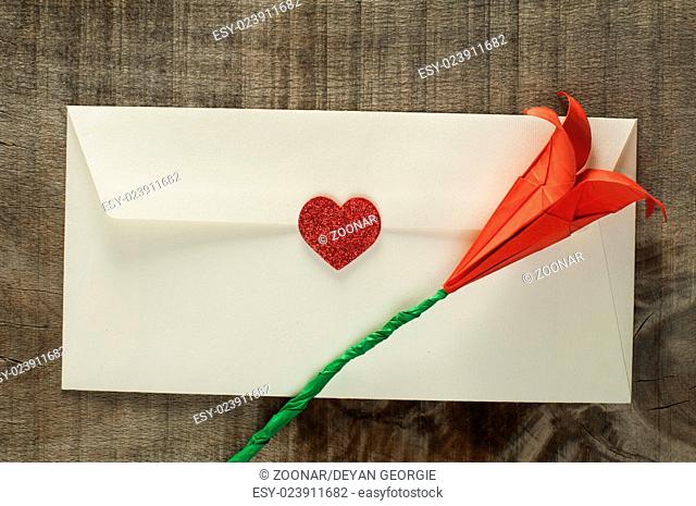 Red hearts and white envelope
