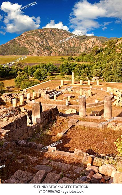 The 1st cent B C Terrace Temple dedicated to Zeus Soteros and round sanctuary dating back to the 5th cent B C and dedicated to the god King Basileus Kaunios