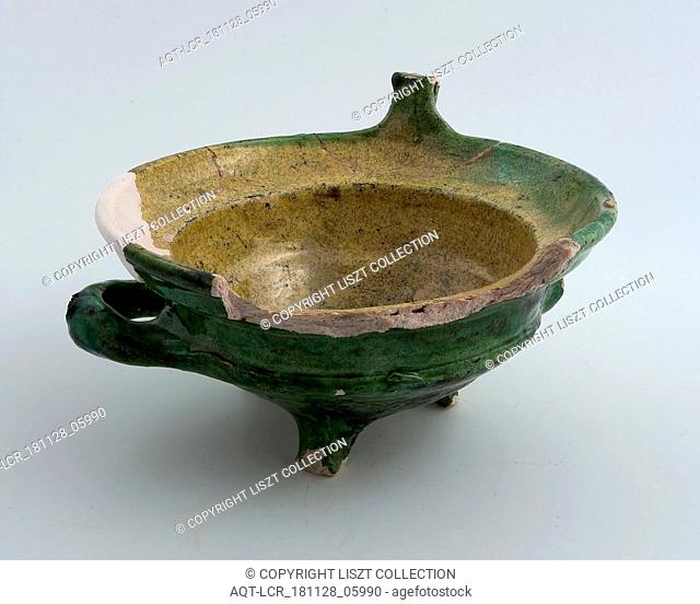Earthenware stain, entirely yellow and green glazed, two horizontal sausages, on three legs, stain soil found ceramic earthenware glaze lead glaze clay
