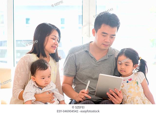 Asian people scanning QR code