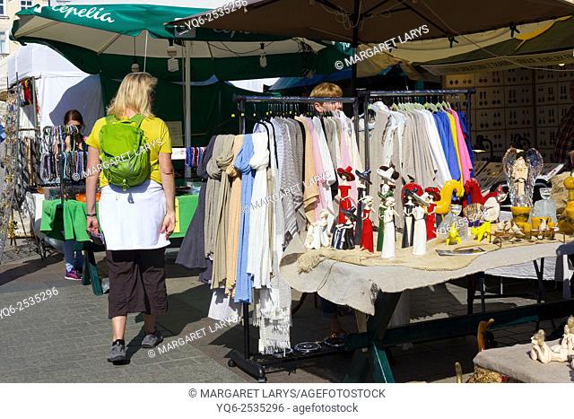 Woman at the antiques fair in Krakow, old historical city in Poland, Europe