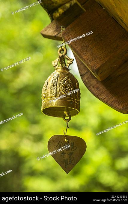 Closeup of a bell at Wat Pha Lat (temple on the slanting rock) in Chiang Mai, Thailand. Wat Pha Lat became a popular resting place on the pilgrimage to Wat Phra...