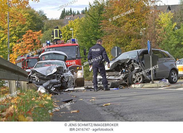 Policeman marking an accident site with a spray can, fatal accident on the L 299 highway, Lindlar, North Rhine-Westphalia, Germany, Europe