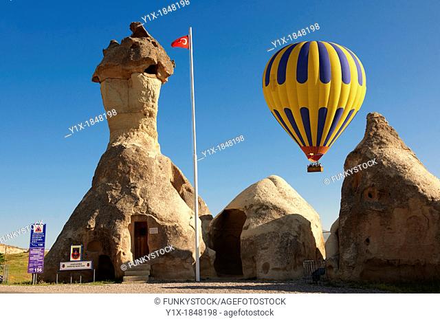 Hot Air Baloons over the Fairy chimney Police station near Zelve , Cappadocia Turkey