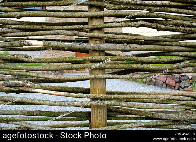 closeup wicker weave wooden twig fence background