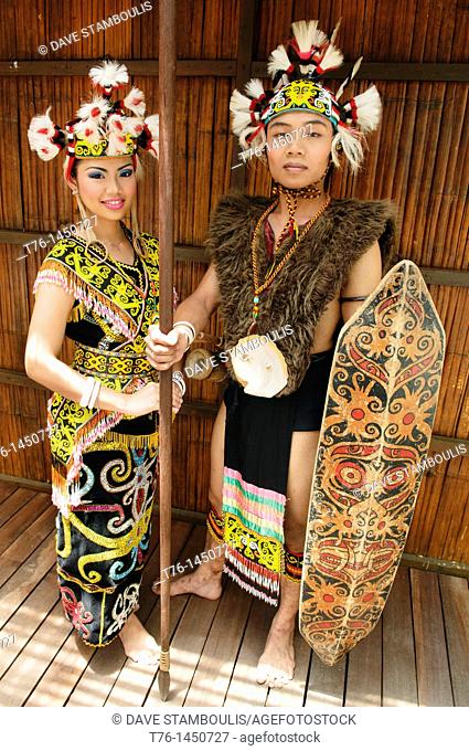portrait of a traditional Orang Ulu warrior and Kenyah woman in Sarawak, Borneo, Malaysia