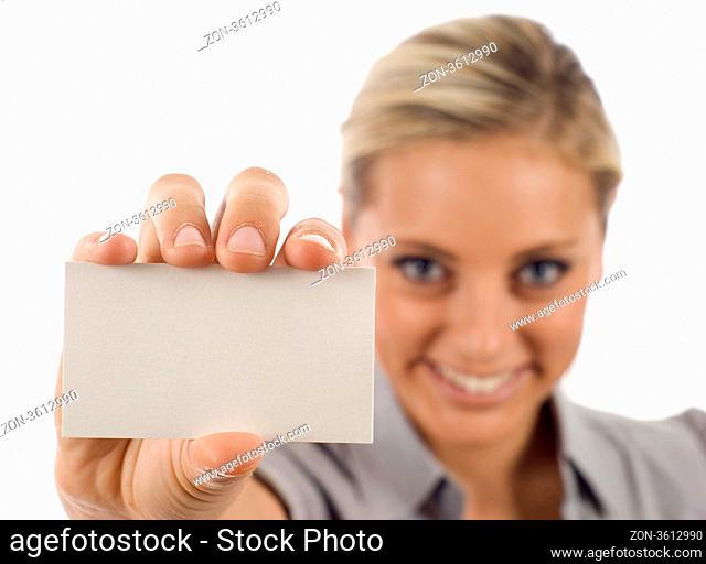 Businesswoman showing and handing a blank business card, the focus was on the business card