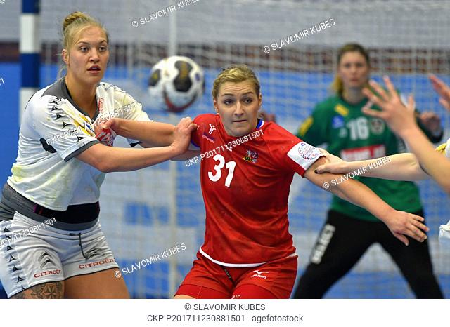 Stefanie Kaiser of Austria, left, and Czech handball player Alena Setelikova in action during the friendly match Czech Republic vs