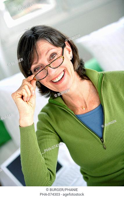 Middle-aged woman with prescription glasses
