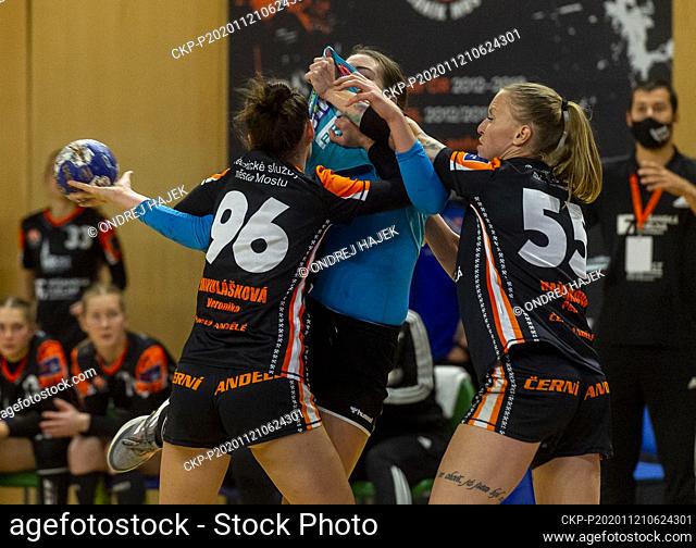L-R Veronika Mikulaskova (Most), Rita Lakatos (Vaci) and Petra Manakova (Most) in action during the Banik Most vs Vaci NKSE match of women's handball Europe...
