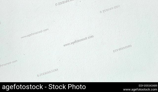 Grungy painted wall texture as background. Cracked concrete vintage wall background, old white painted wall. Background washed painting