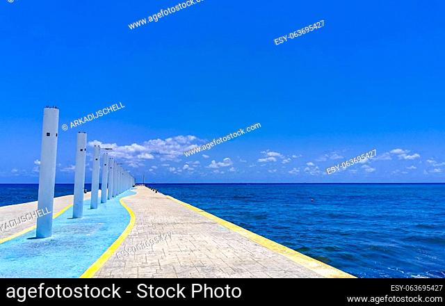 Tropical mexican caribbean beach landscape panorama at Constituyentes pier with corals stones boulders rocks and clear turquoise blue water in Playa del Carmen...