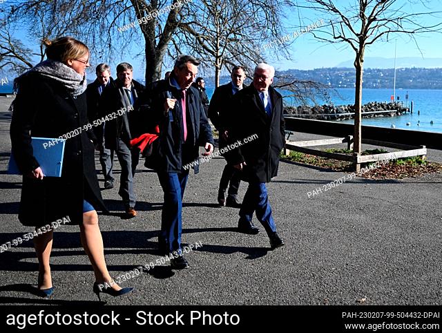 07 February 2023, Switzerland, Genf: German President Frank-Walter Steinmeier (r)..during a walk..along Lake Geneva with Katharina Stasch (l)