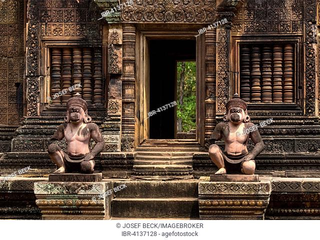 Yaksha Guardian, guardian figures in front of Mandapa and the southern Prasat, Khmer Hindu temple Banteay Srei, Angkor region, Siem Reap Province, Cambodia