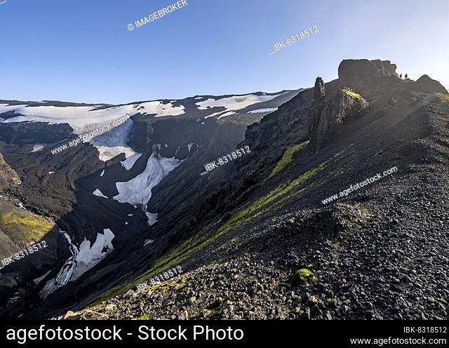 Rock formations and gorge of volcanic rock, Myrdalsjökull glacier in the back, Fimmvörðuháls hiking trail, Heljarkambur, Þórsmörk Nature Reserve, Suðurland
