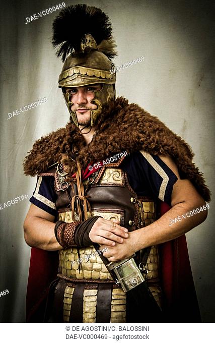 Ancient Greek general with helmet, cape and leather and metal plate armour. Historical reenactment