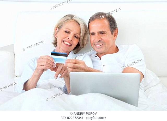 Happy Couple Shopping Online