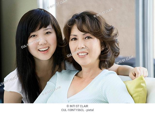 Portrait of smiling mother and daughter