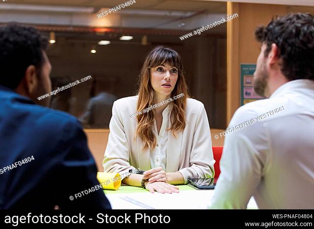 Serious businesswoman having a meeting in office