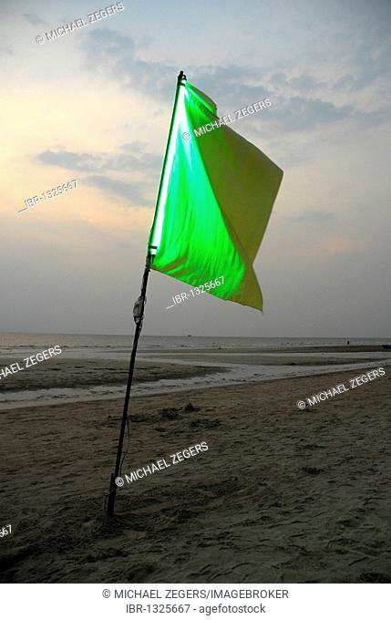Sunset, green flag at White Sand Beach, Hat Had Sai Khao, Koh Chang Island, National Park Mu Ko Chang, Trat, Gulf of Thailand, Thailand, Asia