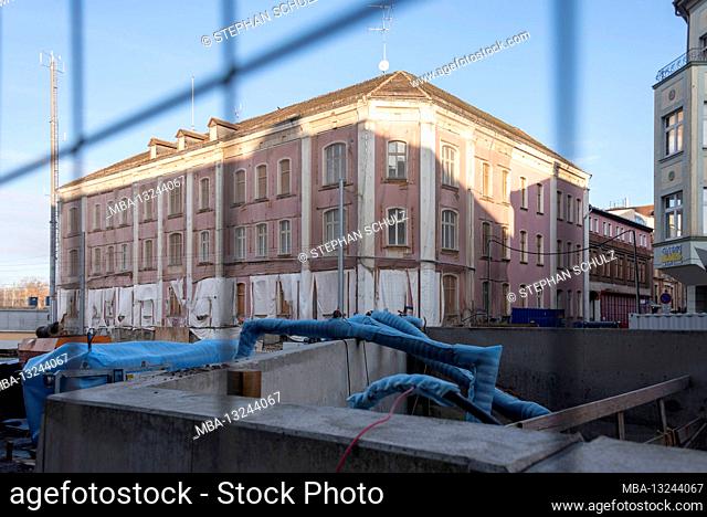 Germany, Saxony-Anhalt, Magdeburg, old residential building with boarded-up windows