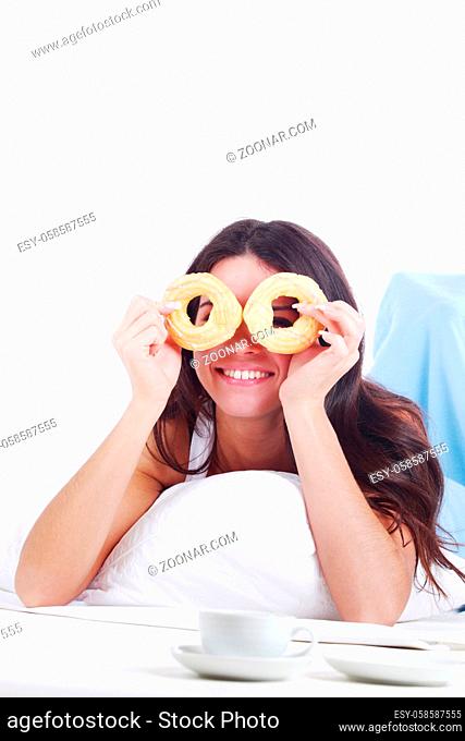 woman wake and see morning coffee and donuts