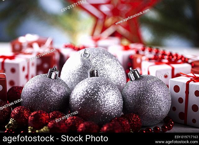 Christmas background with baubles and gift